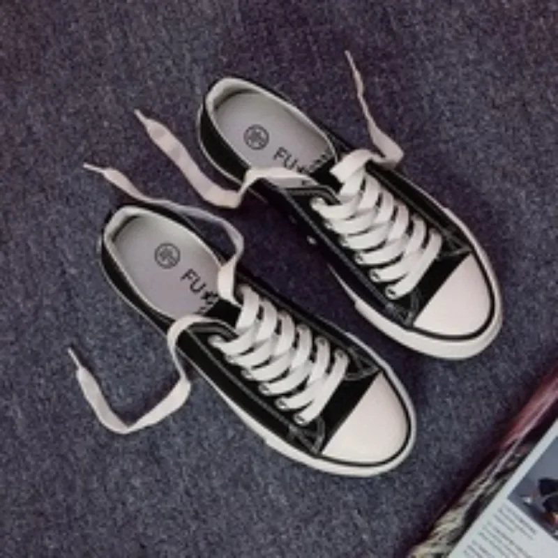 รองเท้าสําหรับสตรี Low-Top Vulcanized ผ้าใบรองเท้าผ้าใบสีดํารองเท้าเทนนิสหญิงคลาสสิกนักเรียนคู่เล็กๆสเก็ตบอร์ด