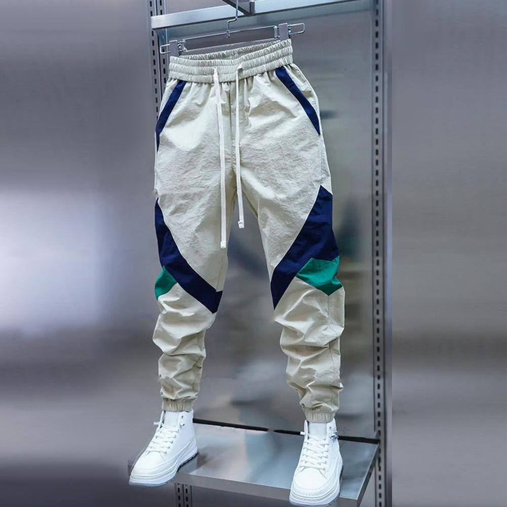 กางเกงคาร์โก้สําหรับผู้ชายหลายกระเป๋ายืด Joggers กางเกงสีกากีผู้ชายฮาเร็มหลายกระเป๋าผ้าฝ้ายฮาราจูกุขนาดใหญ่สไตล์เกาหลี