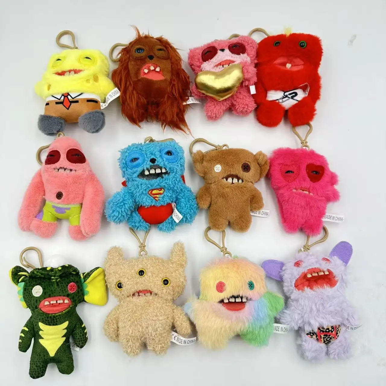 12cm huggler engraçado feio monstro brinquedos de pelúcia chaveiro kawaii fugge monstro coelhos bonito pelúcia peluche bonecas pingentes presentes