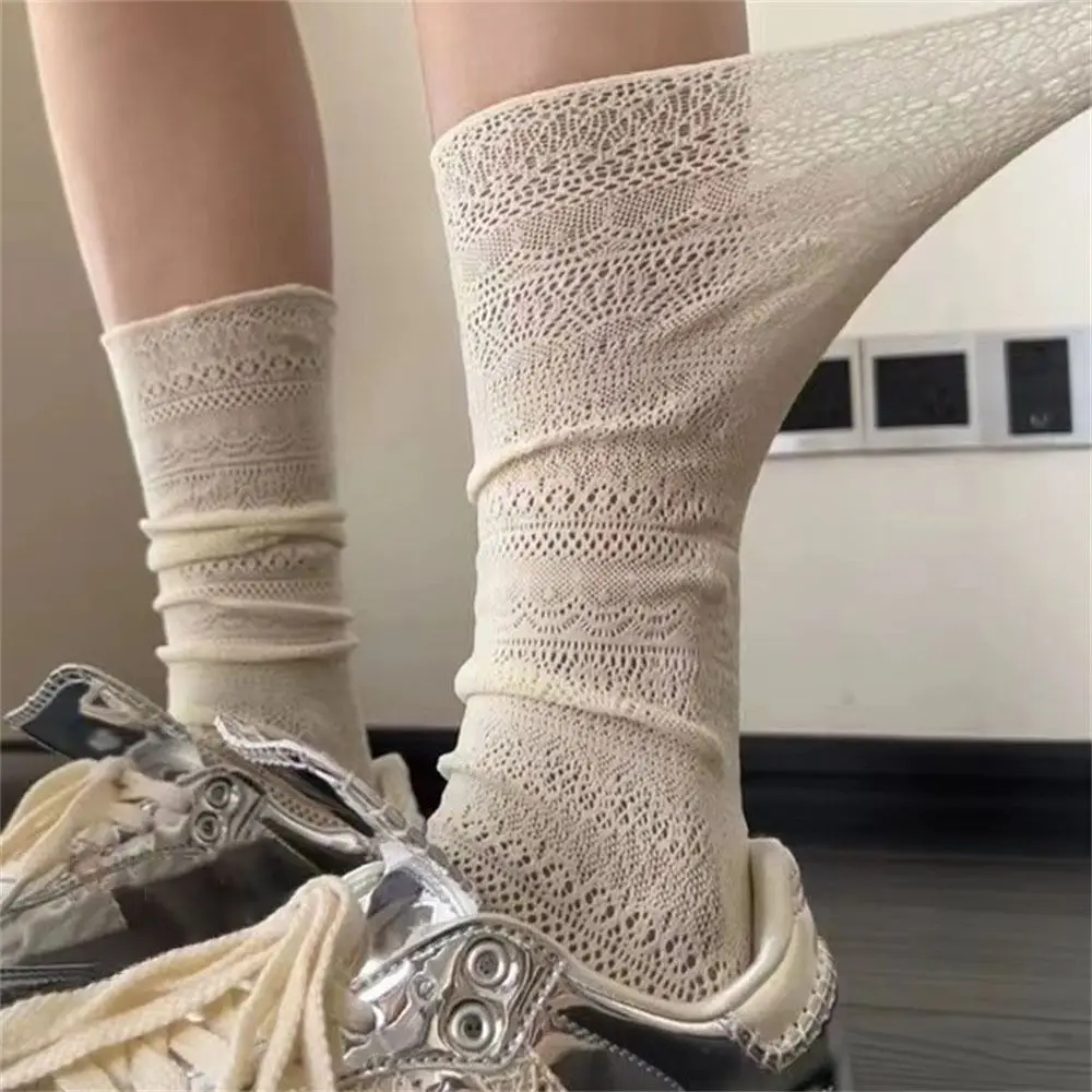 Calcetines de malla ahuecados de Lolita para mujer, medias transparentes de encaje fino, calcetines de seda Retro con flores