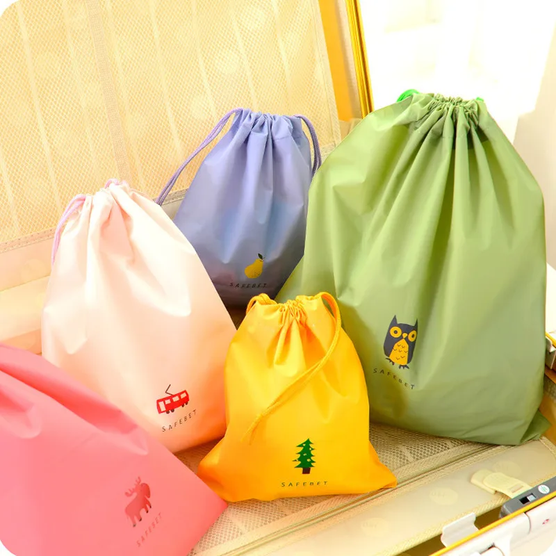 Bolsa de almacenamiento de bolsillo impermeable, productos para el hogar, bolsa minimalista con cordón a prueba de polvo, bolsa de almacenamiento de ropa de viaje creativa