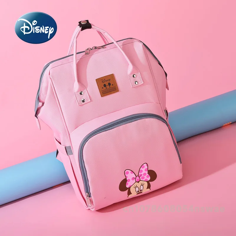 Disney's New กระเป๋าผ้าอ้อมกระเป๋าเป้สะพายหลังแบรนด์หรูกระเป๋าแฟชั่นเด็กการ์ตูนน่ารักกระเป๋าผ้าอ้อมเด็กขนาดใหญ่ความจุ Multi Function