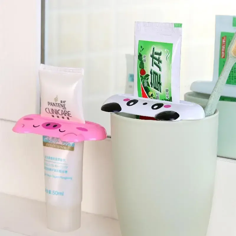 สําหรับห้องน้ํา 1 ชิ้นสัตว์ง่ายยาสีฟันพลาสติกฟันหลอดยาสีฟัน Squeezer Rolling ผู้ถือ Cocina