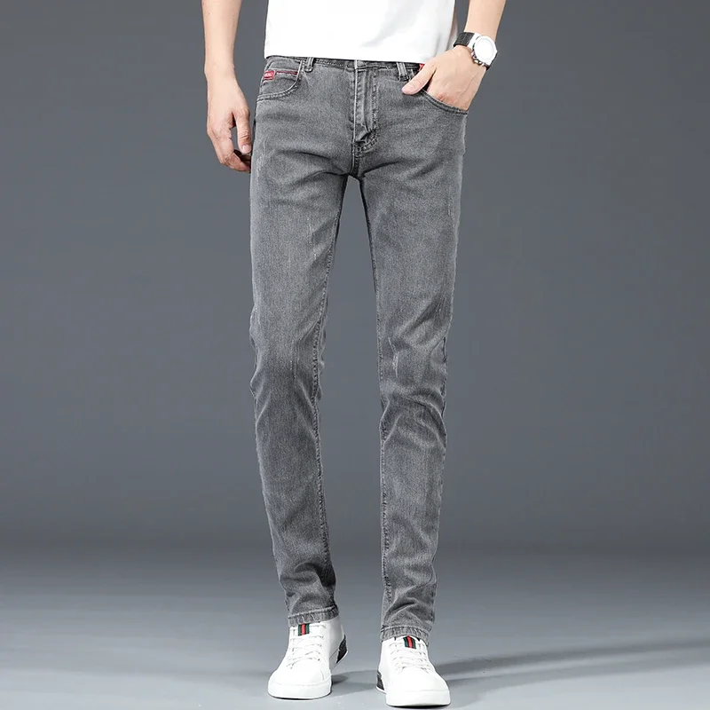 2024 nuevos pantalones vaqueros ajustados informales de negocios de algodón para hombres pantalones vaqueros ajustados rectos elásticos a la moda para hombre azul gris