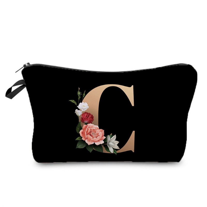2024 Nuovo prodotto Moda Borsa di stoccaggio creativa Borsa da toilette portatile Fondo nero Borsa per trucco stampata con lettera dorata hz3183