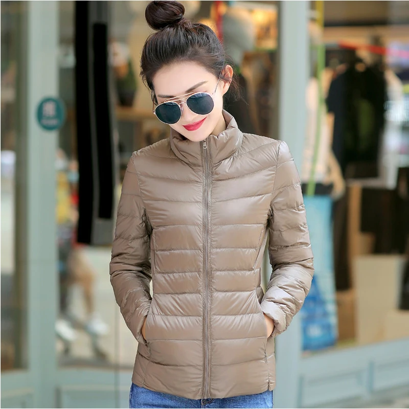 M-5XL Trắng Vịt Xuống Áo Khoác Nữ Mùa Đông Ấm Áp Xuống Phối Trọng Lượng Nhẹ 2022 Mới Cổ Áo Đứng Túi Dây Kéo Thông Thường áo Khoác Ngoài