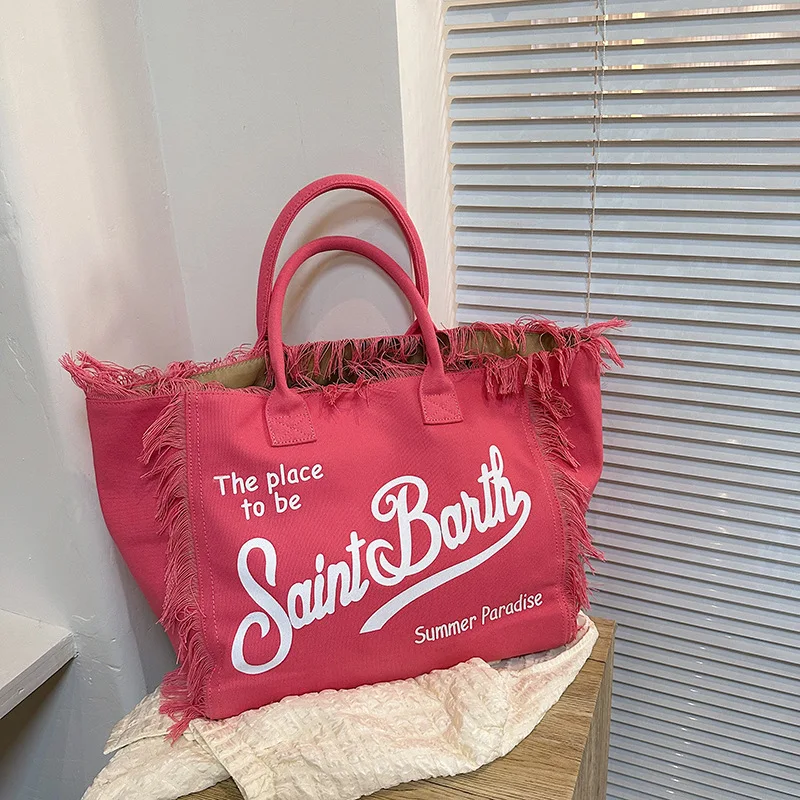 Korean letters tassel canvas bag large capacity bag bag simple commuter student to single shoulder Tote bag