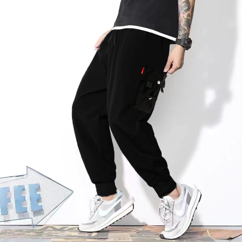การออกแบบคลาสสิก Multi Flap Pockets Cargo กางเกงผู้ชายหลวม Fit Drawstring Harem Cargo Jogger กางเกงกางเกงขนาดใหญ่ผู้ชายและผู้หญิง