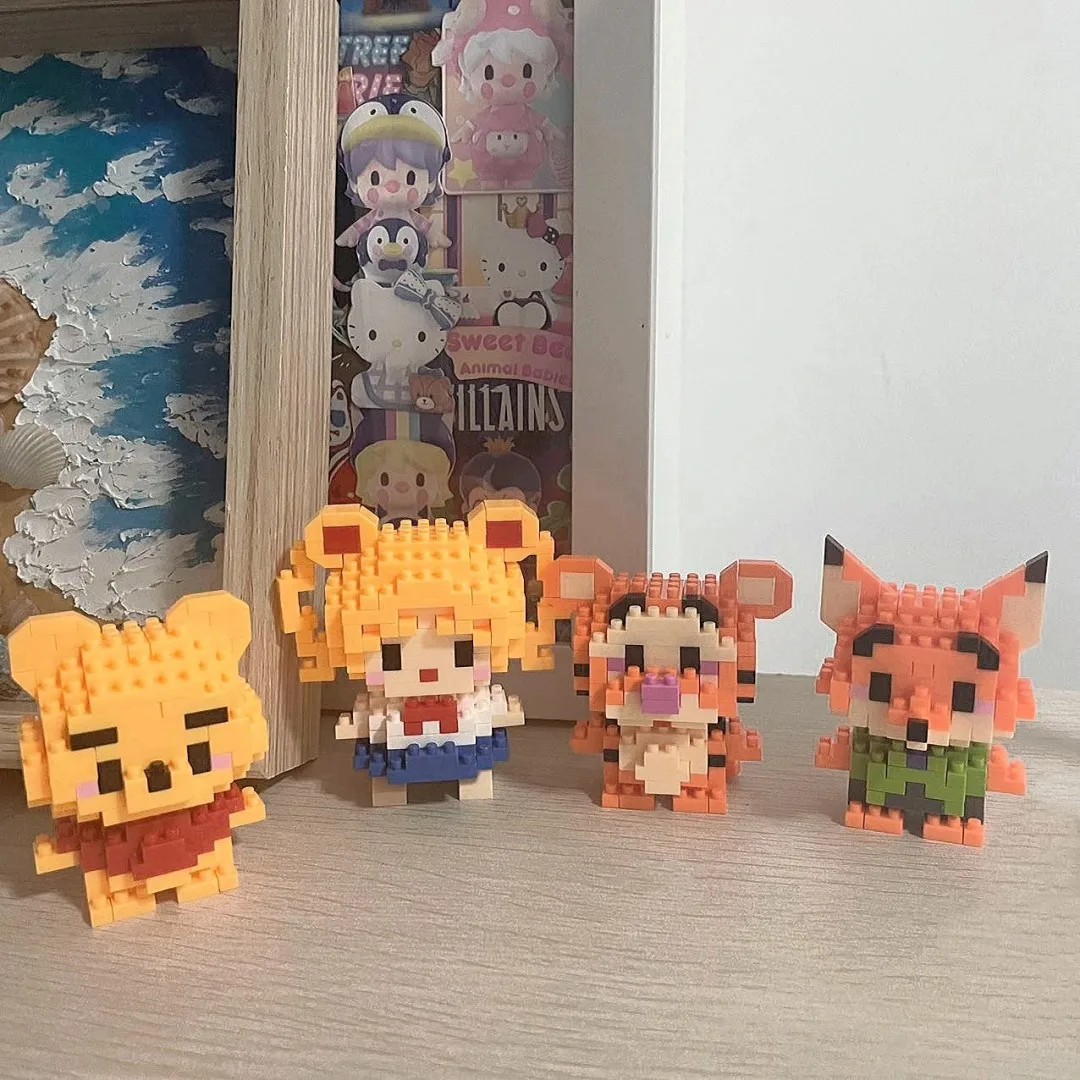 子供のためのディズニーステッチのビルディングブロック,漫画のフィギュア,ミニアクションフィギュア,レンガの組み立て,DIYおもちゃ,ギフト,カワイイ