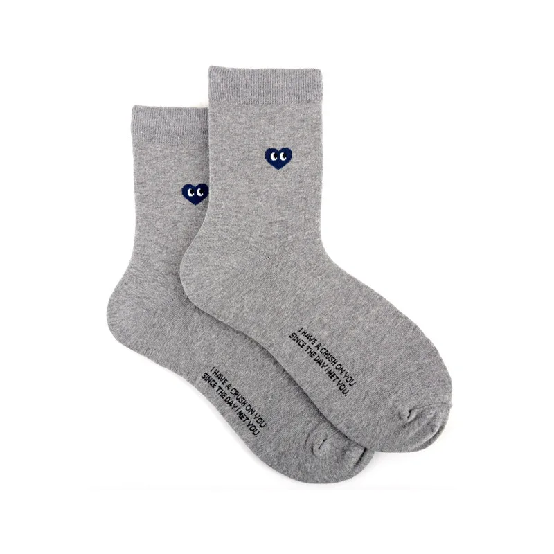Calcetines Ins transpirables y absorbentes para caballero versión coreana blanco y negro color sólido amor moda en el viento deportivo de ocio