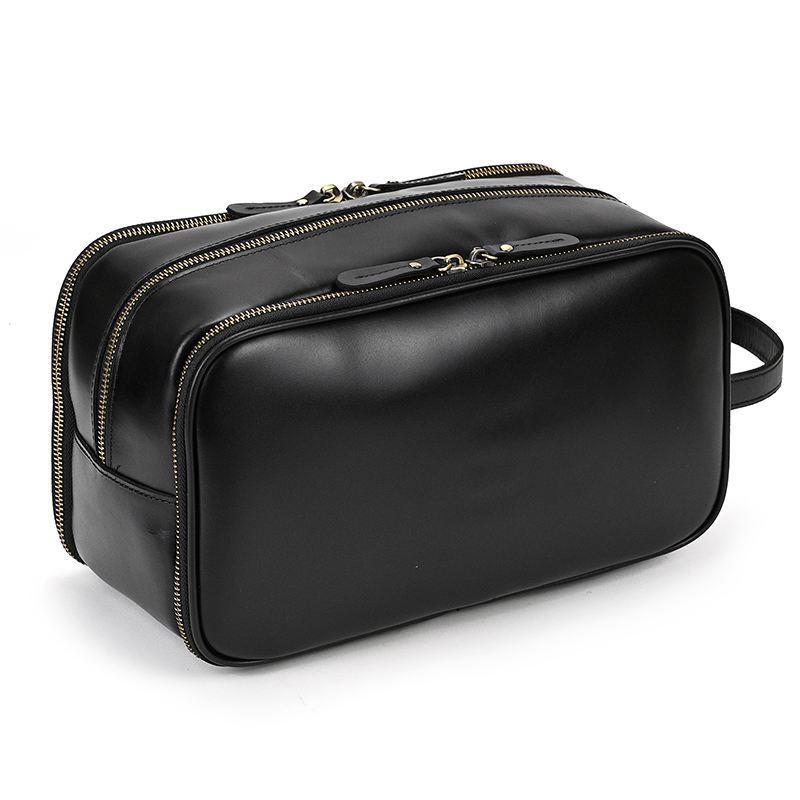 Bolsa de viaje de cuero genuino para hombres y mujeres, bolsas de maquillaje de estilo lujoso negro, bolsa de lavado para hombre y mujer, bolsa de almacenamiento de artículos de tocador