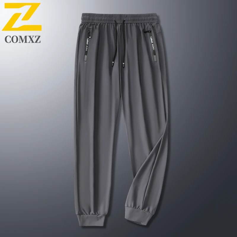 2025 verão masculino fino gelo seda calças casuais solto ajuste plus size de secagem rápida elástico corredores 9/4 comprimento cônico tornozelo moletom