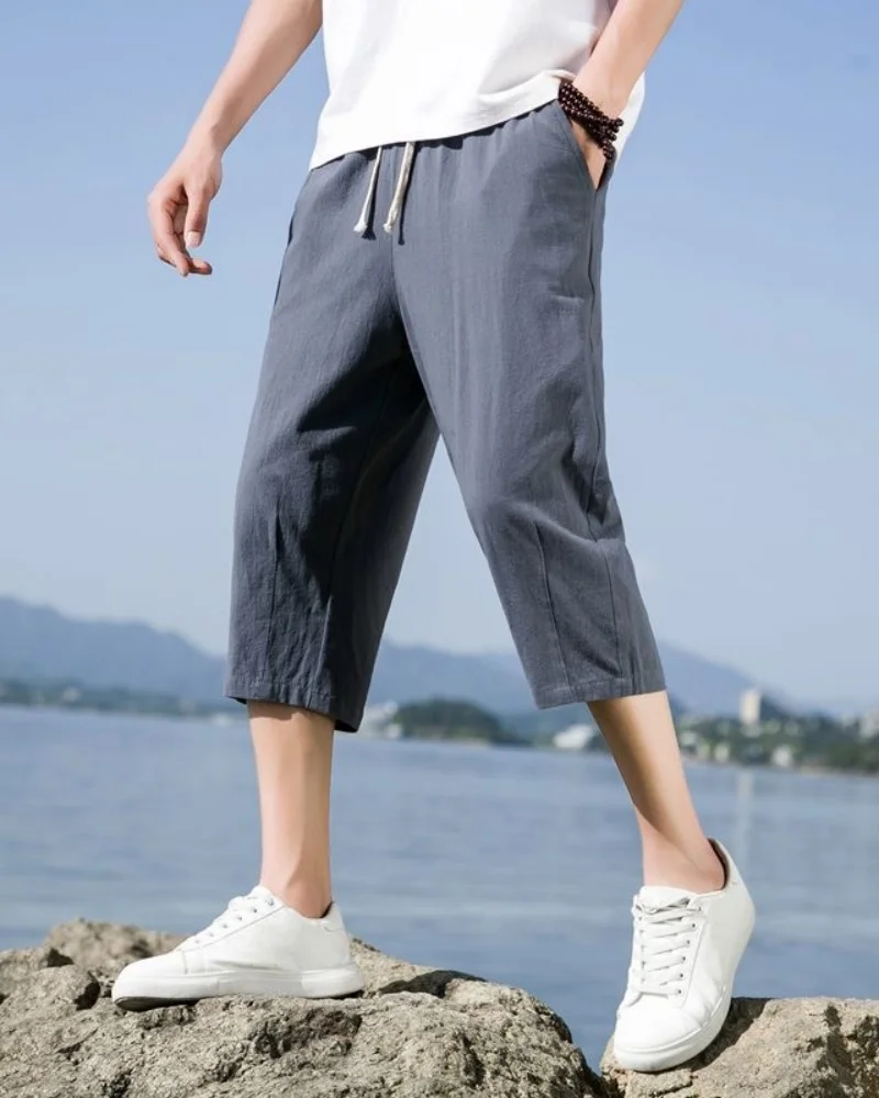 Novedad de verano, pantalones cortos deportivos informales de 5 piezas transpirables de lino y algodón sueltos para hombre ZK72