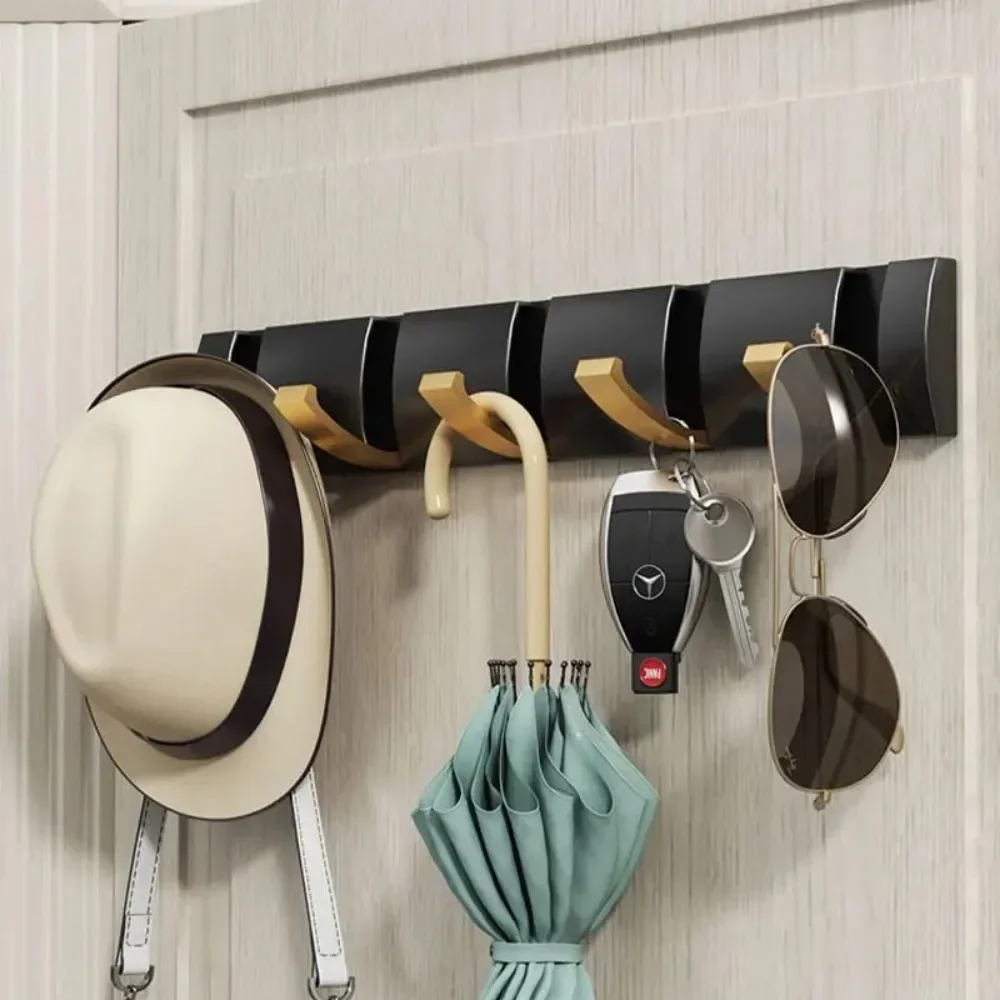 สีดํา Golden Robe Hook RacksTowel แขวนพับไม่มี Punch ติดตั้งติดผนัง Rack Hooks Coat ผู้ถือเสื้อผ้าห้องน้ํา