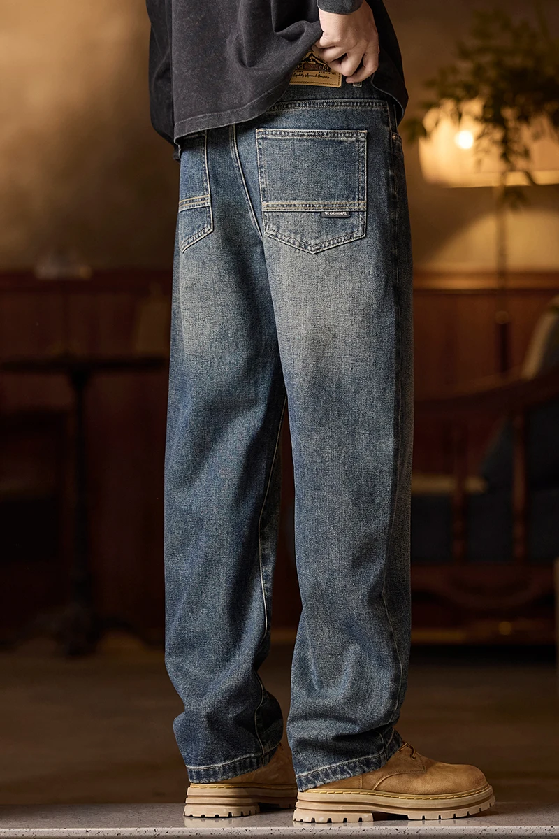 Vaqueros de cintura elástica para hombre Vaqueros azules de corte relajado con cintura elástica con cremallera y botón