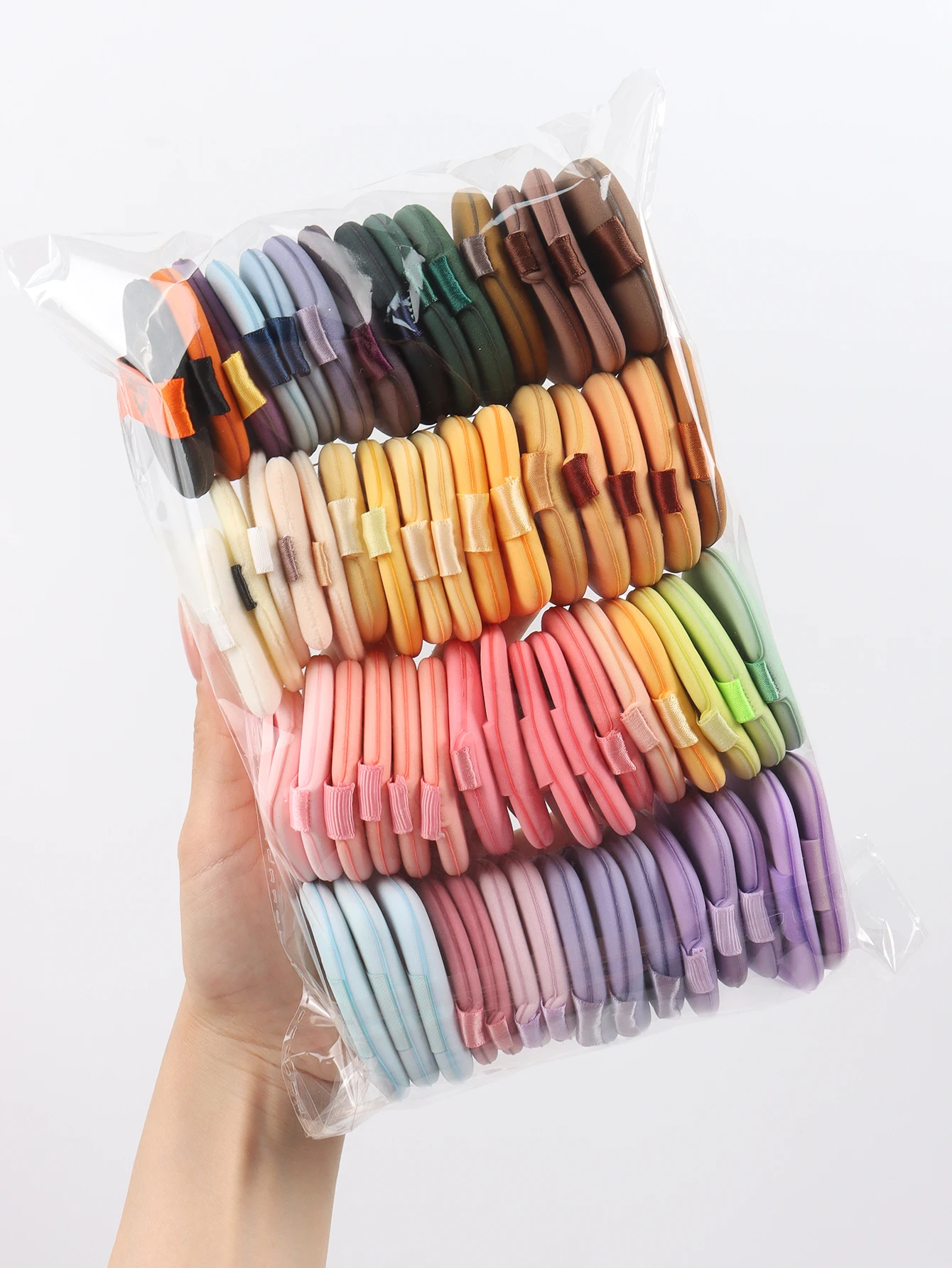Soplo de polvo con cojín de aire 10-20-30-50 bolsas Colores y formas aleatorios. Contiene soplo de polvo con cojín de aire, mezcla de esponjas sin látex y