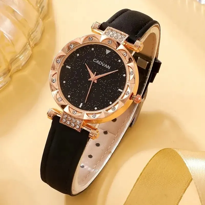 Reloj de pulsera de cuarzo con esfera redonda de cielo estrellado simple para mujer