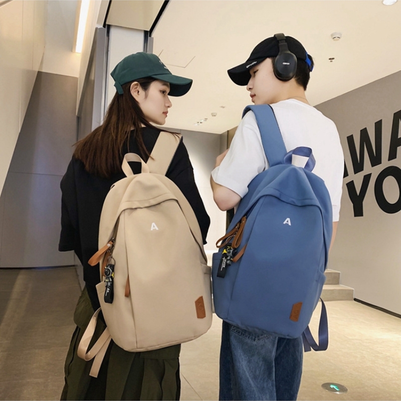 Simple fashion college students schoolbag Couple hundred with large capacity backpack leisure travel men and women universal bag