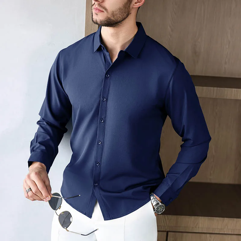 Nueva camisa informal de negocios de manga larga de Color sólido para hombre, resistente a las arrugas, cómoda, versátil para todas las estaciones