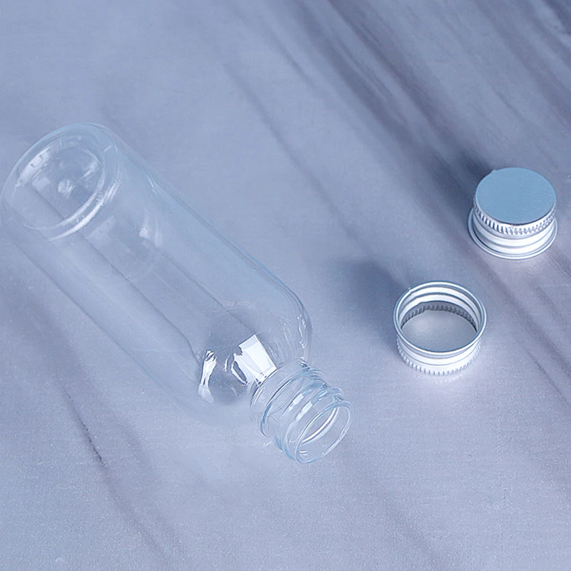 50 Uds 5ml 10ml 30ml 50ml 100ml botella de plástico tapa de aluminio botella de muestra de loción transparente contenedor cosmético vacío para viaje