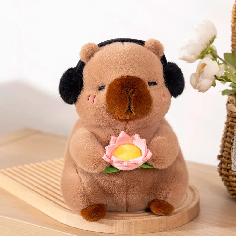1 ชิ้นใหม่น่ารัก Capybara ตุ๊กตาของเล่นตุ๊กตาสัตว์ Capybara ตุ๊กตานุ่มถือดอกไม้ของเล่นเด็กของขวัญวันเกิด