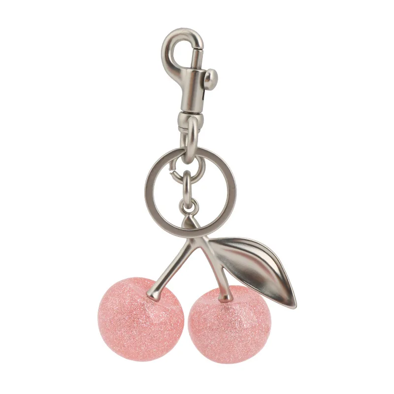 Llavero con dije de cereza de cristal rosa brillante para bolso de entrenador, bolso de hombro, llavero de cereza para mujer, pieza de fijación