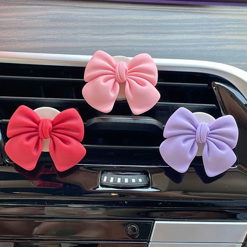 Ambientador de aire para coche, nudo de lazo, Perfume para coche, estilo de coche, olor Natural, Clip de salida de aire acondicionado, fragancia, accesorios para automóvil
