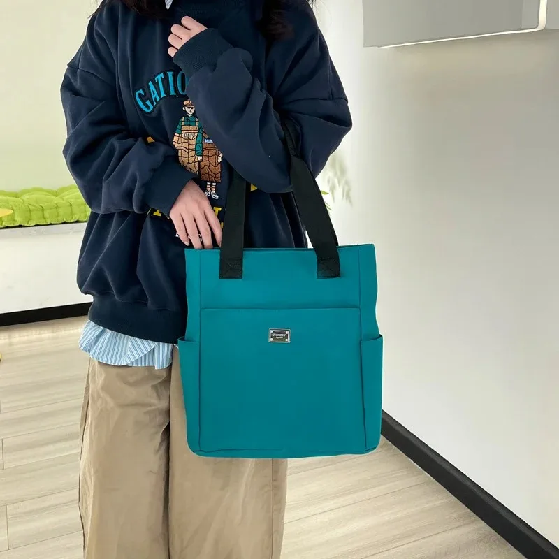 Leichte und wasserdichte Umhängetasche, Handtasche mit großem Fassungsvermögen, geeignet für Arbeit, Studium und Reisetasche