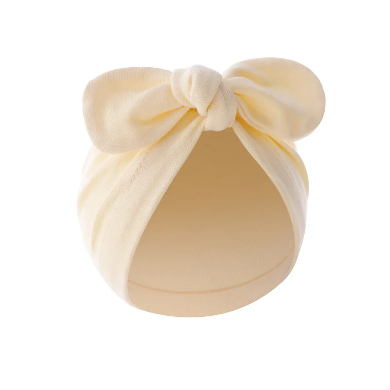 หมวกทารกแรกเกิดสําหรับเด็กผู้หญิงหมวกน่ารัก Bows Turban หมวกผ้าฝ้ายทารก Bonnet สีทึบหมวกเด็กวัยหัดเดินเด็กอุปกรณ์เสริม 0-24M