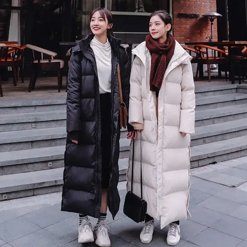 เสื้อโค้ทตัวยาวผ้าคอตตอนสำหรับผู้หญิงแจ็คเก็ตขนเป็ดแจ็คเก็ตฤดูหนาว2023แบบเกาหลีสำหรับผู้หญิงแจ็คเก็ตขนเป็ดเสื้อขนเป็ดยาวแบบหลวมสำหรับผู้หญิง