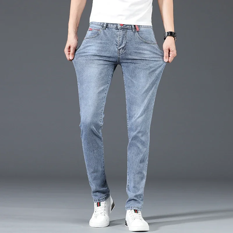 2024 nuevos pantalones vaqueros ajustados informales de negocios de algodón para hombres pantalones vaqueros ajustados rectos elásticos a la moda para hombre azul gris