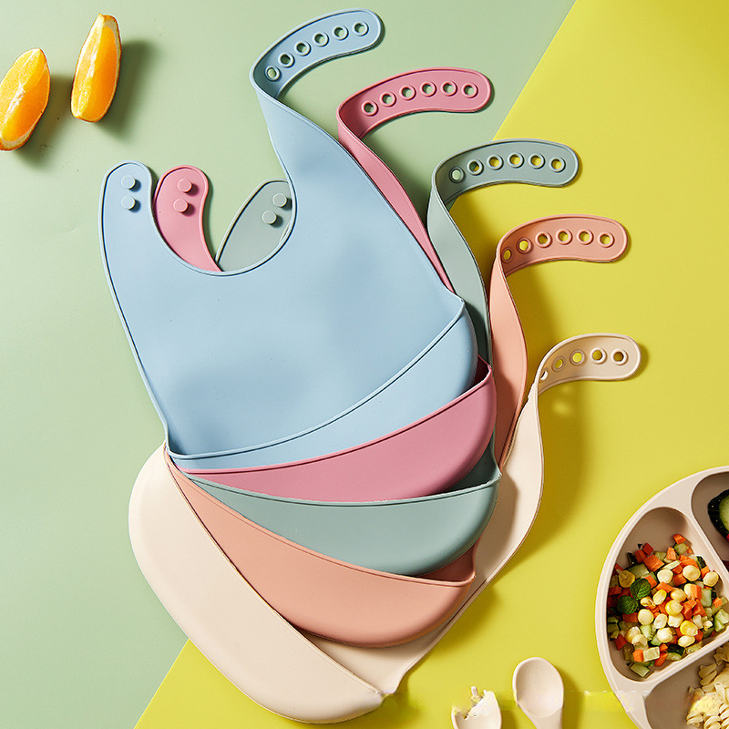 เด็กซิลิโคน Bibs ทารกกันน้ํา Bib สีทึบ 6-speed ปรับน้ําลายกระเป๋าเด็ก Burp Cloths อุปกรณ์เสริมทารกแรกเกิด
