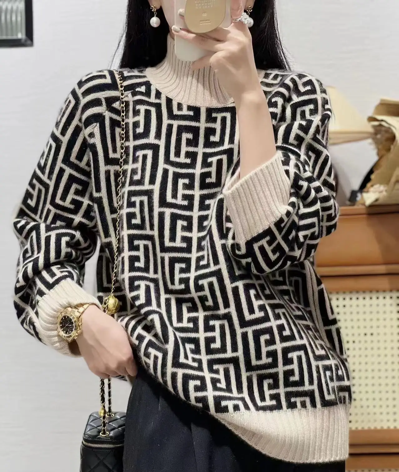 Suéter de cabra de 100% de gama alta para mujer, suéter suelto con cuello levantado, otoño e invierno, nuevo estilo de estilo occidental con reducción de edad