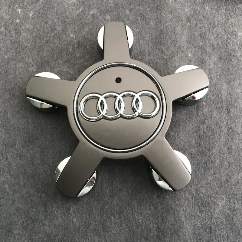 4PCS รถห้ากรงเล็บศูนย์ล้อ HUB ครอบคลุมอัตโนมัติสัญลักษณ์อุปกรณ์ตกแต่งสําหรับ AUDI A4 B8 B6 B9 b7 A3 8P 8V 8L A6 C7 C6