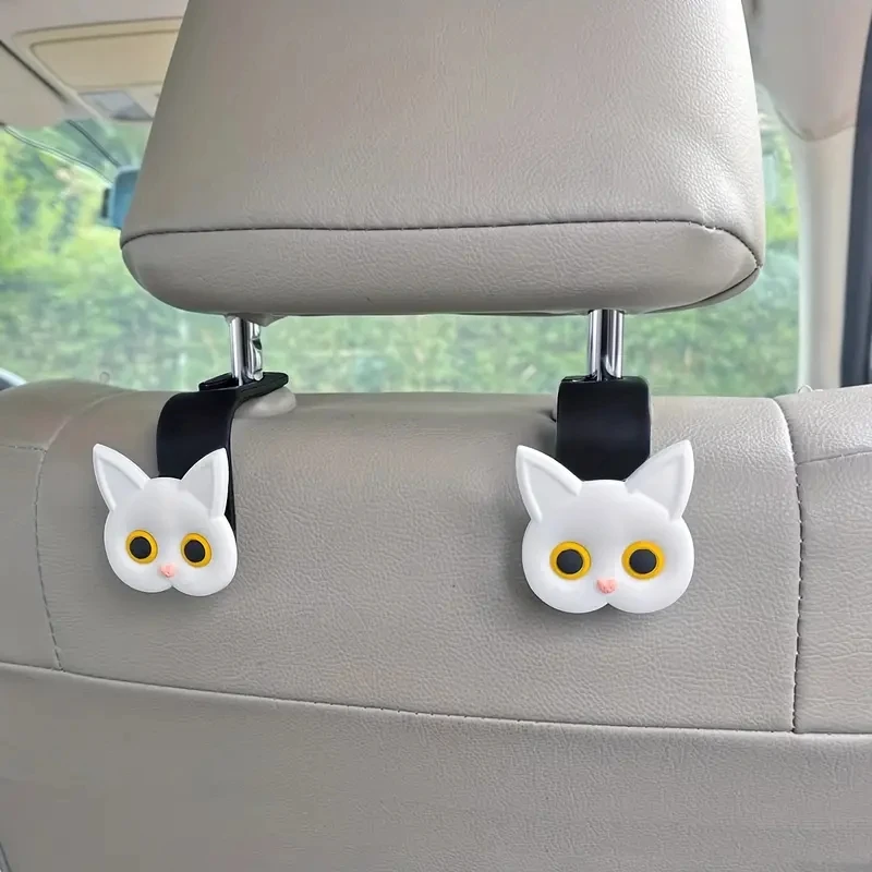 Ganchos para reposacabezas de asiento de coche con diseño de gato de dibujos animados en 3D, organizador Universal de almacenamiento de vehículos para bolsos, monederos, abrigos, 2 uds.