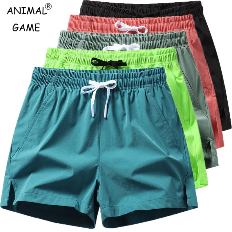 Pantaloni sportivi da uomo estivi Pantaloncini casual Tasche Pantaloni leggeri di base in tinta unita Pantaloncini da spiaggia da jogging da uomo