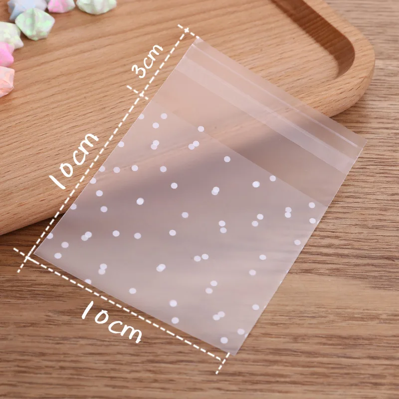 Sacchetti di caramelle in cellophane trasparenti di plastica da 100 pezzi Sacchetti regalo autoadesivi per biscotti di caramelle a pois bianchi per la festa di compleanno di nozze