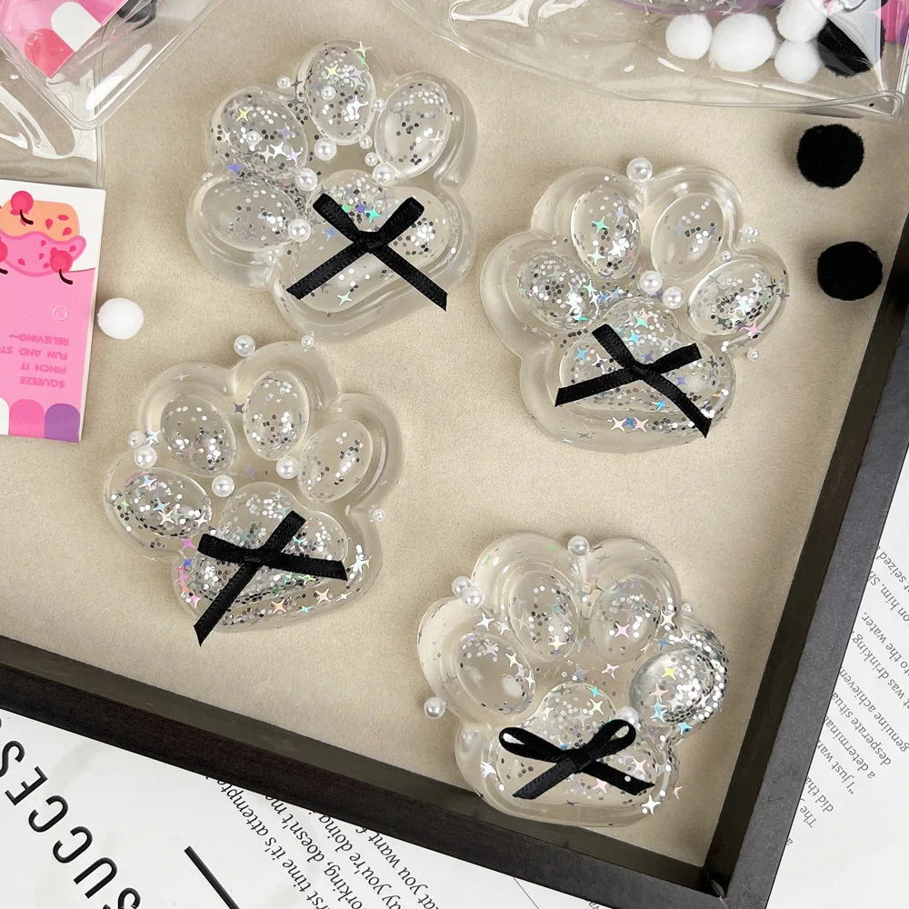 Creative TPR โปร่งใสสีดํา Bow Cat PAW ช้า Rebound บีบของเล่นการ์ตูน Cat Claw Sticky Pinch Sensory ของเล่นสําหรับของขวัญเด็ก