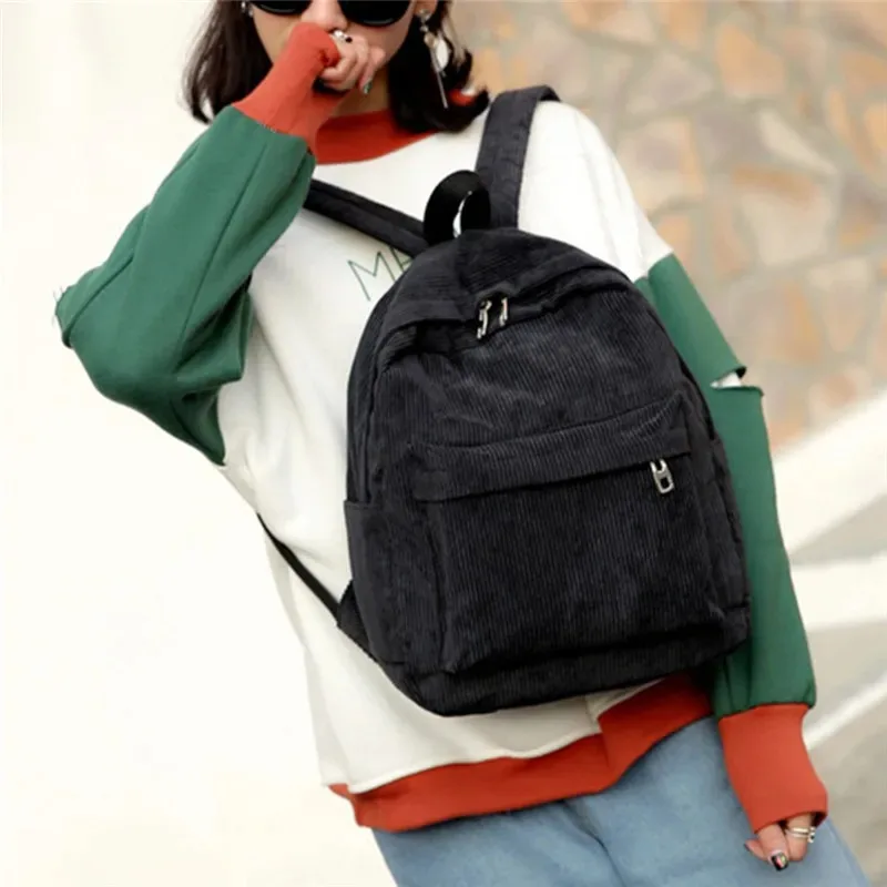 ใหม่ Corduroy ผู้ชายและผู้หญิงกระเป๋าเป้สะพายหลังสไตล์วิทยาลัยอเนกประสงค์และขนาดใหญ่กลางแจ้งอินเทรนด์กระเป๋านักเรียนนักเรียน