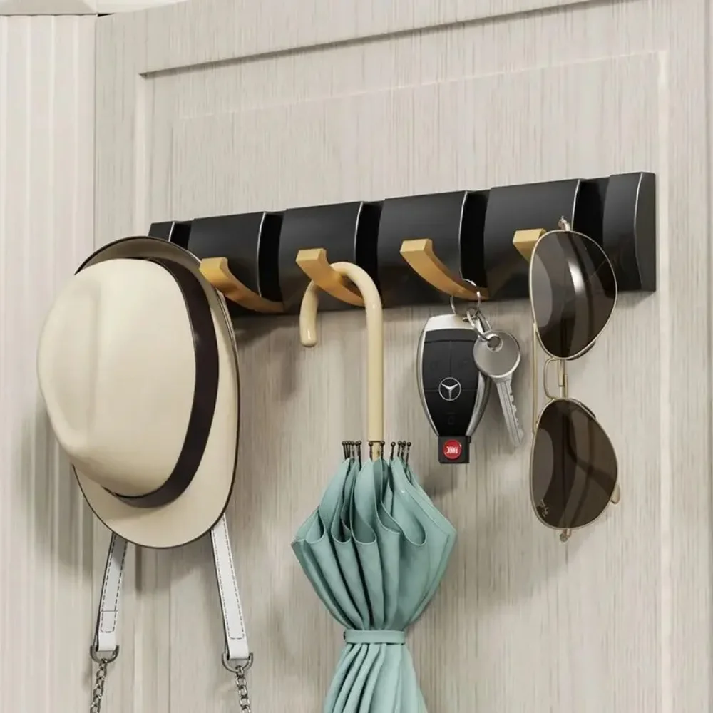 สีดํา Golden Robe Hook RacksTowel แขวนพับไม่มี Punch ติดตั้งติดผนัง Rack Hooks Coat ผู้ถือเสื้อผ้าห้องน้ํา