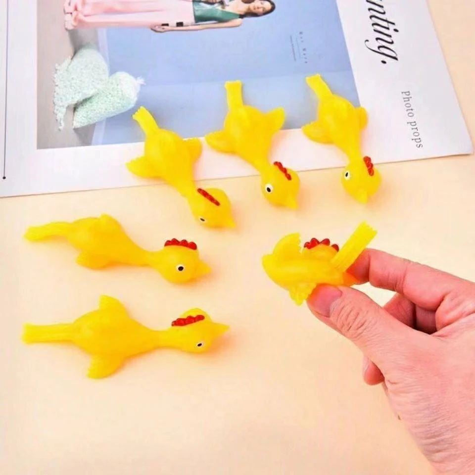 5-50 pçs novidade catapultada ejeção frango brinquedo luz borracha dedo brincadeira brinquedo voador estilingue frango dedo brinquedos turquia pegajoso