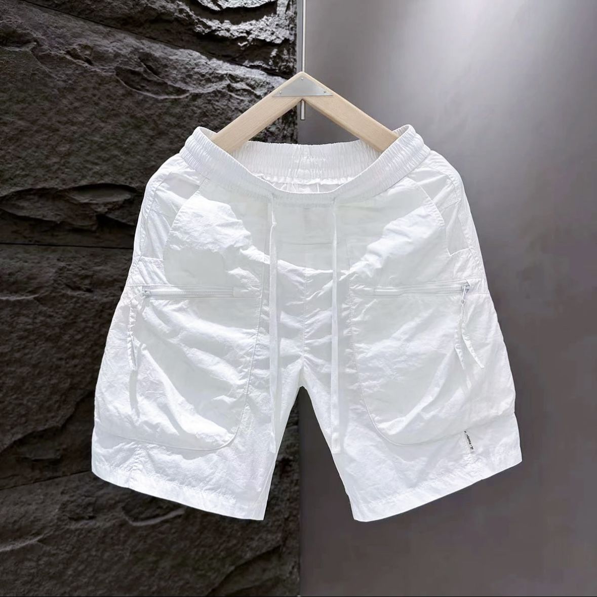 Calções de carga com zíper de bolso de verão masculino na moda marca versátil solto de secagem rápida esportes soltos casuais calças de praia de cinco pontos