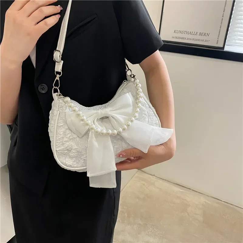 ไข่มุกหญิงกระเป๋าRetro Luxury Designerกระเป๋าถือCrossbodyกระเป๋าแฟชั่นผ้าใบผู้หญิง2024แนวโน้มไหล่กระเป๋า