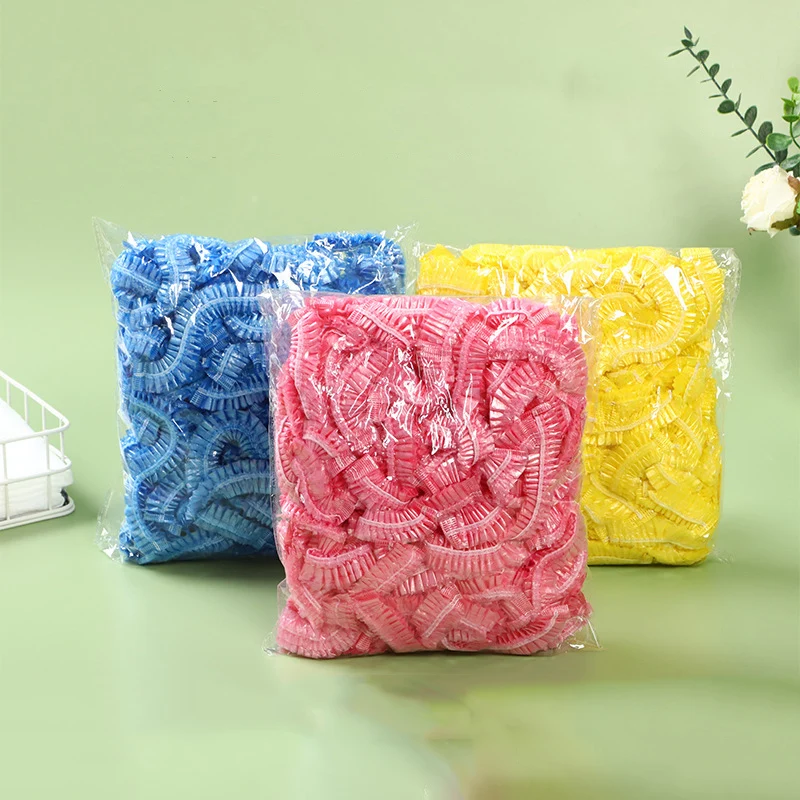 Gorro de ducha desechable para mujer, cubierta de plástico impermeable para la cabeza, salón de Spa rosa, tinte para el cabello de Hotel, gorro elástico para el cabello, 100 unidades por juego