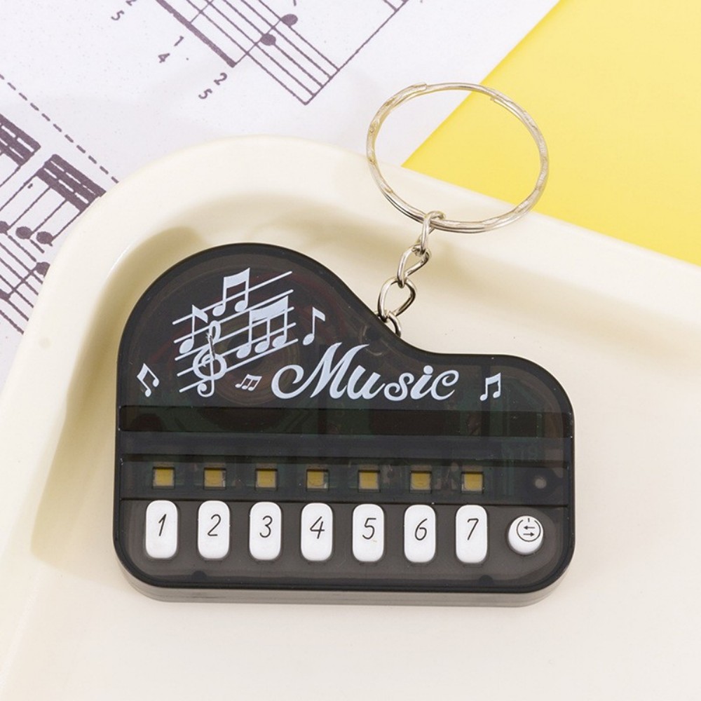 Mini Portable Electronic Keyboard Keychain Musical Instrument Toy - Compact Travel Piano Keychain for Music Lovers