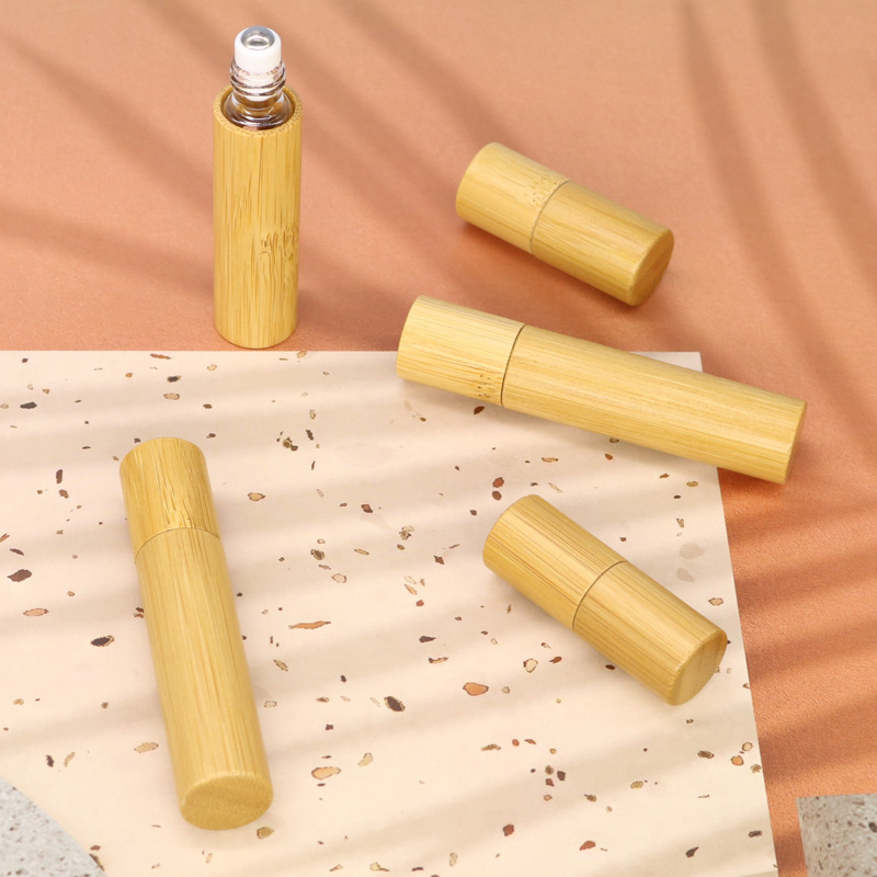 Botella de madera de bambú de 3ml, 5ml, 10ml, botella de aceite vacía para Perfume, rollo inoxidable en bola, botella de Perfume para aromaterapia, botella con rodillo de aceite