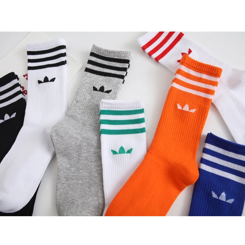 Calcetines deportivos puros a la moda de tubo de alto Color, calcetines de algodón con trébol para hombres y mujeres, calcetines Ins salvajes, calcetines a rayas, novedad de 2024