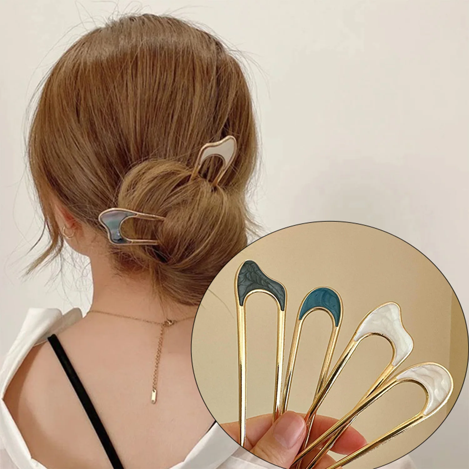 Dames gebruiken elegante schelpglazuurde hoorns in goud en zilver, modieuze, U-vormige metalen haarspelden, haaraccessoires en hoofddeksels