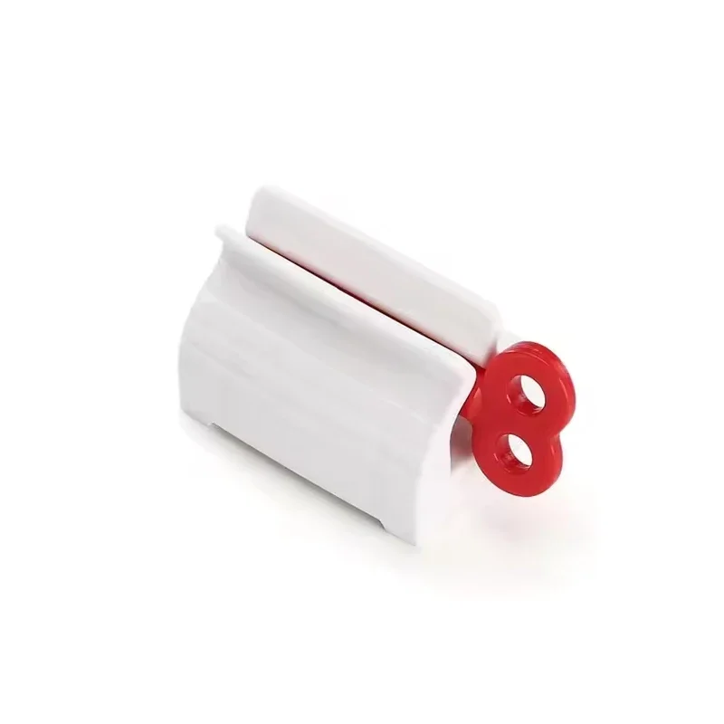 Rolling Tube ยาสีฟัน Squeezer ยาสีฟันที่นั่งผู้ถือขาตั้งหมุนเครื่องจ่ายยาสีฟันสําหรับห้องน้ํา
