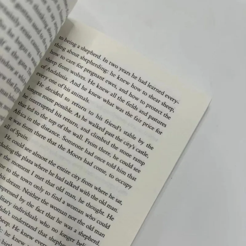 นักเล่นแร่แปรธาตุ โดย Paulo Coelho ฉบับครบรอบ 25 ปี นิยายวรรณกรรมคลาสสิก หนังสือภาษาอังกฤษ นวนิยายในภาษาอังกฤษ libro firmas